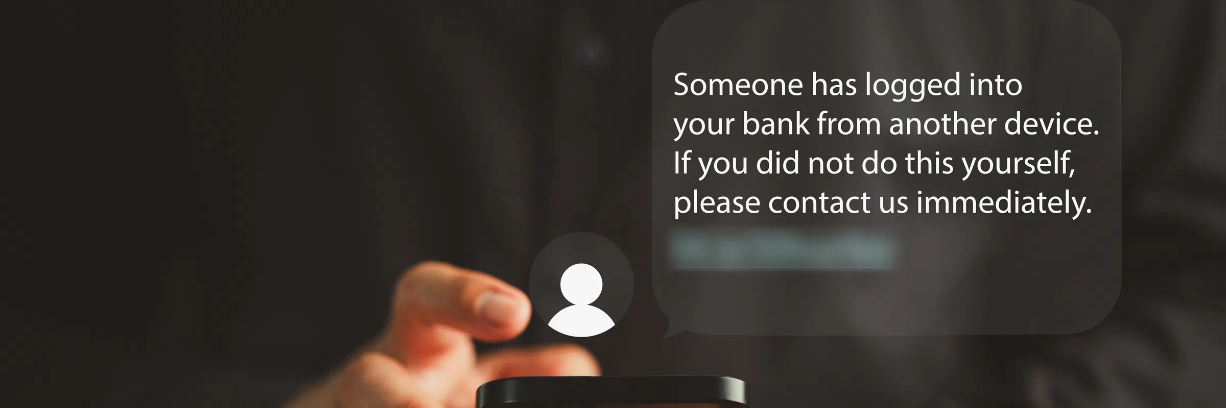 A man holding a phone, with a fake text message alert claiming someone logged into his bank and a shortened link to tap